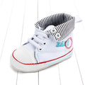 Cuffed striped baby shoes