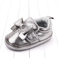 Shiny bow baby shoes