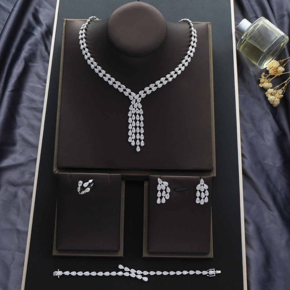 Heavy-duty 4-piece Set Featuring A Water-drop Pendant A Double-layer Water-drop Necklace Earrings A Ring And A Bracelet