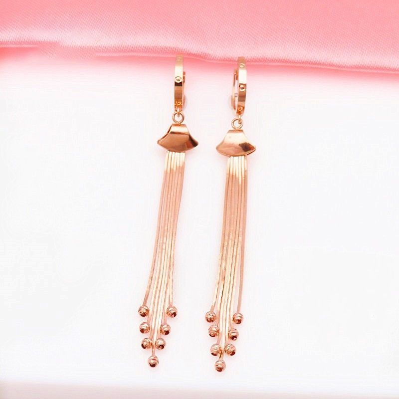 Long Tassel Earrings With A Purple Jade Snake Bone Design
