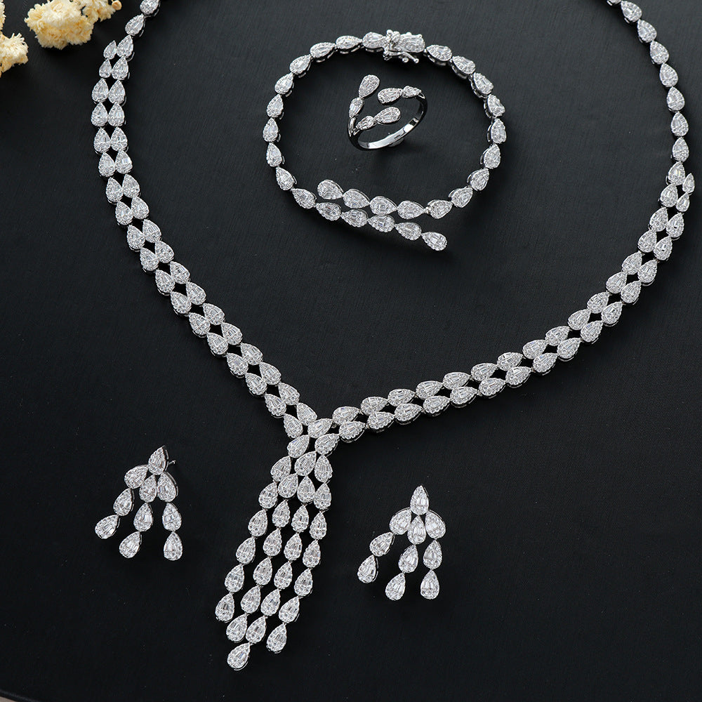 Heavy-duty 4-piece Set Featuring A Water-drop Pendant A Double-layer Water-drop Necklace Earrings A Ring And A Bracelet