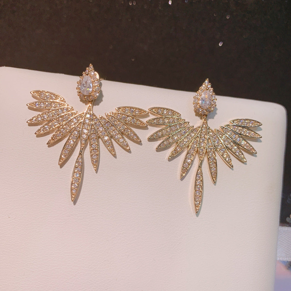 Diamond-encrusted Angel Wing Earrings