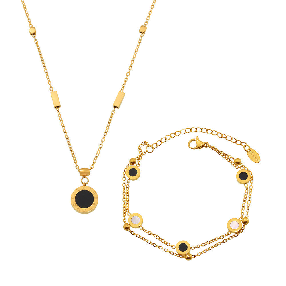 Black And White Shell Necklace With The Word In Roman Numerals