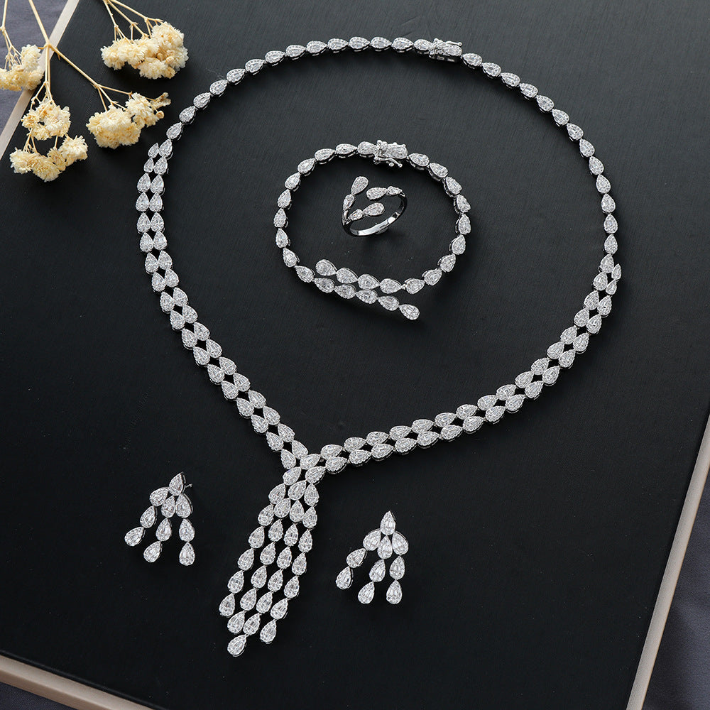 Heavy-duty 4-piece Set Featuring A Water-drop Pendant A Double-layer Water-drop Necklace Earrings A Ring And A Bracelet